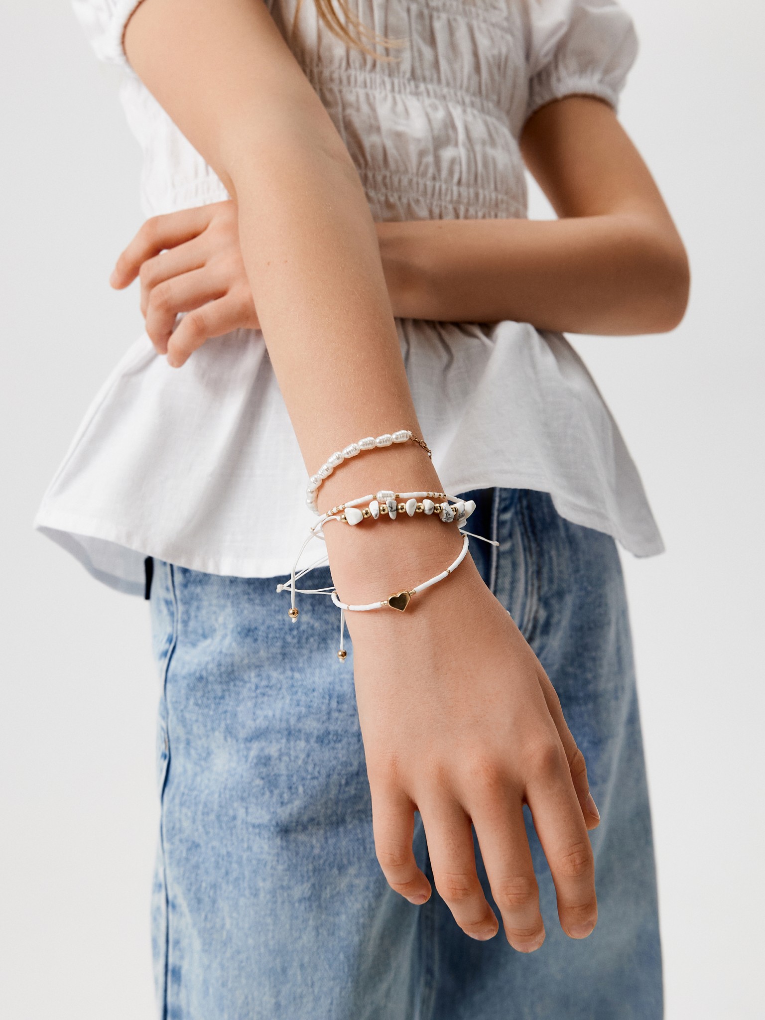 20206200188 Набор из 4 браслетов дет. Lorine белый